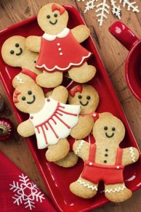 Gingerbread men on a red platter